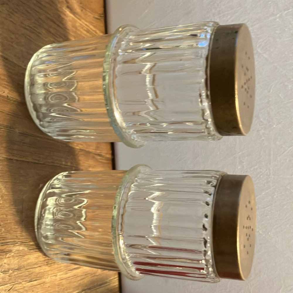 Vintage glass.  jumbo size salt n pepper shakers with brass covers ( abit heavy)